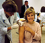 woman being given a flu shot